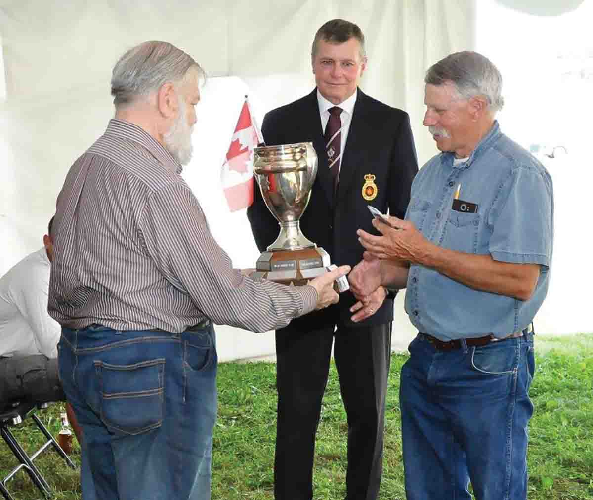 The Royal Rifles of Canada Cup being awarded to Ken Pearcey of Bracebridge, Ontario by Major Don Holmes, retired, in center is our new Executive Director, Lt. Colonel Don Haisell, retired.